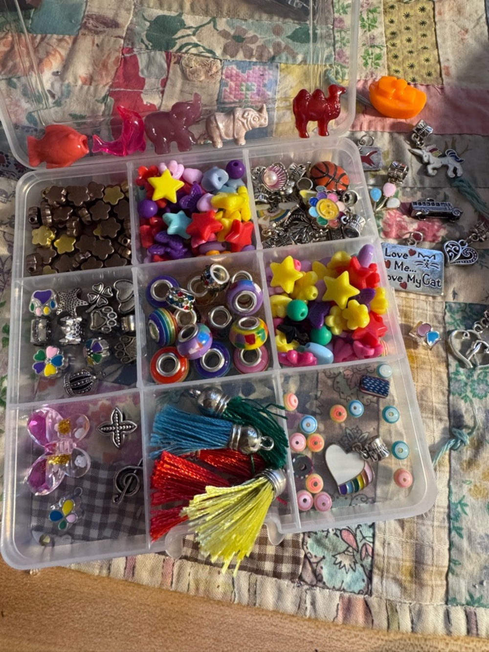 Curated, lots of beads and charms. Rainbows, unicorns, butterflies, colorful! 🌈